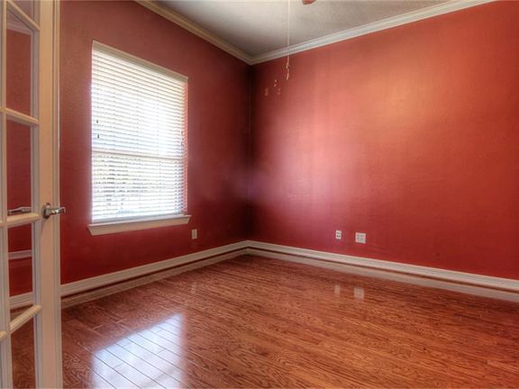 Freshly painted designer colors are found throughout the home; all recently done. Wood flooring in t