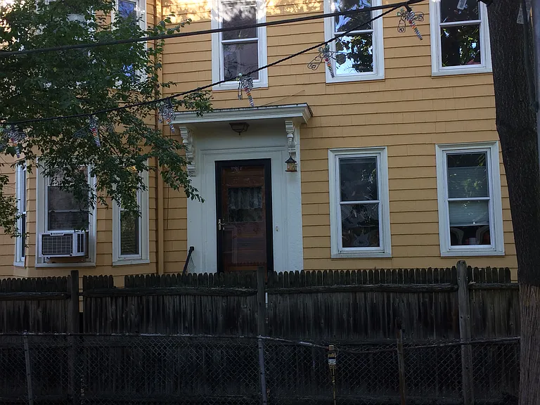 Rear entrance. Three floors of living space.
