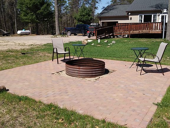 Bricked patio fire pit. 