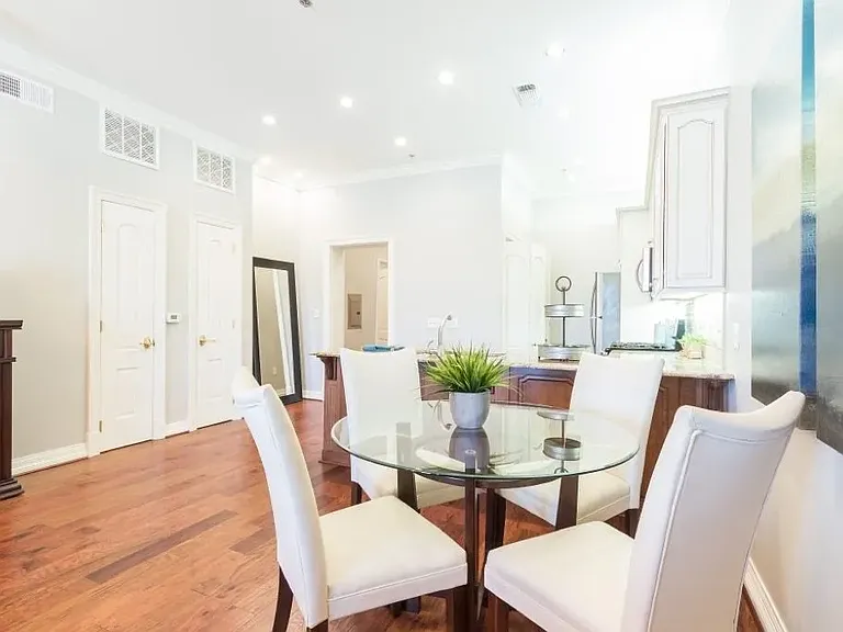 A2/A3 layout with open dining and real hardwood floors.