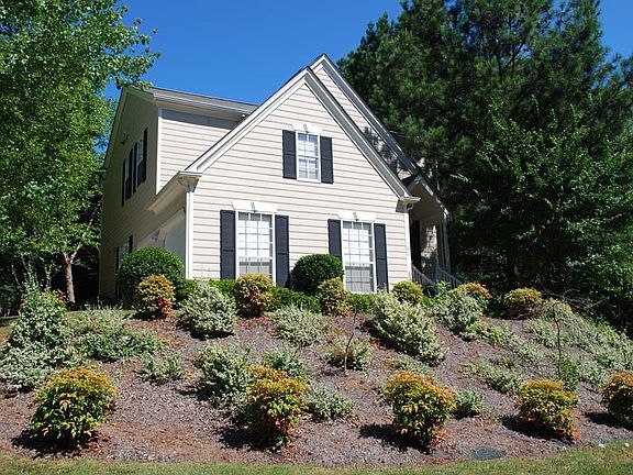 Charming Home with 2 Car Side Entry Garage! Professionally Landscaped Yard.