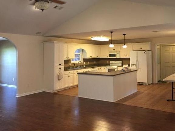 Great kitchen with island. Includes refrigerator, dishwasher, oven/stove, and microwave