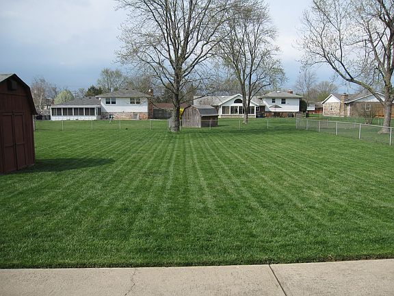 Large level fenced back yard