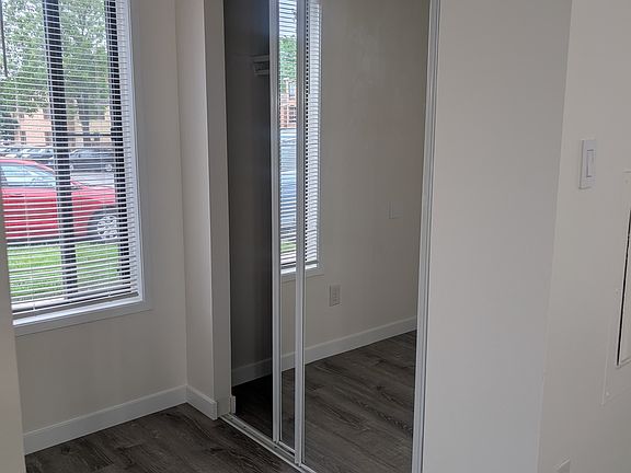 Front foyer with double sided closet with a shelf, convenient for storage