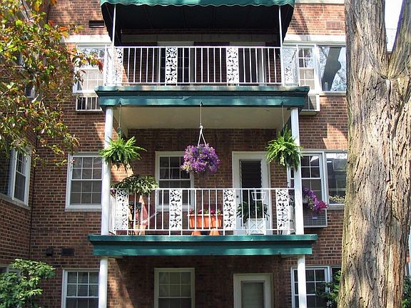 Balcony overlooking garden and golf course