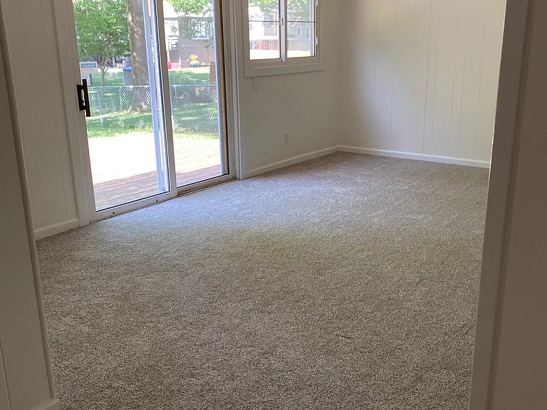 Lower Level Sitting Area with Doors to Patio