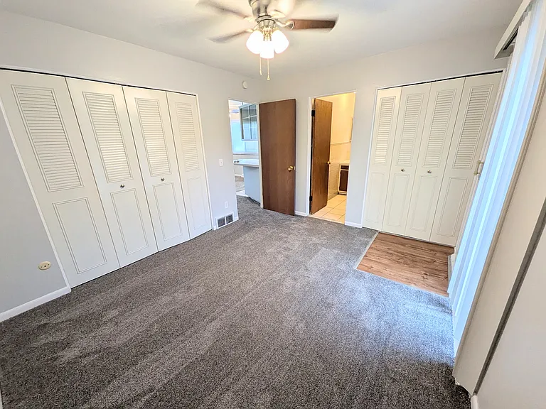 Bedroom with lots of storage space. New carpet and paint