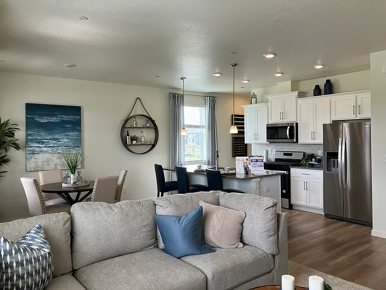 Sample of same floor plan, different finishes, staged with furniture.