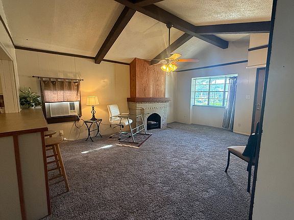 Beamed ceiling is a charming feature