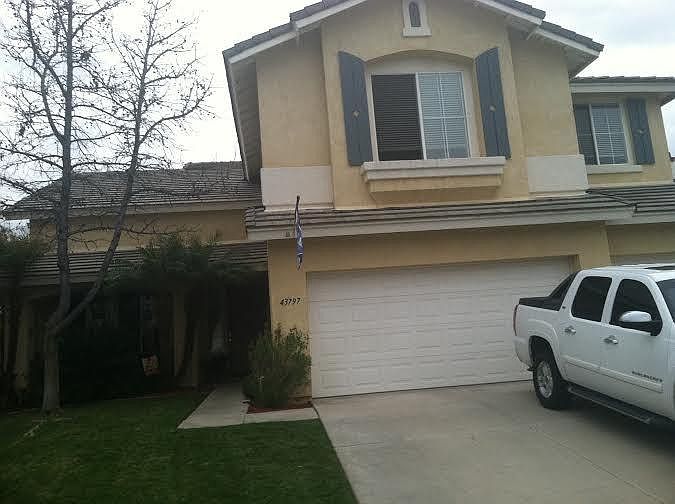 Front of Home w/ 3 car garage