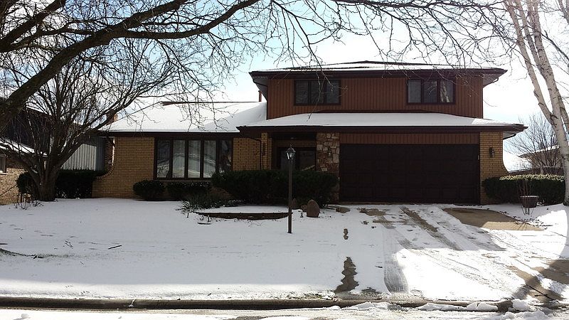 Exterior Front
						:
						Brick and Maintenance Free Siding