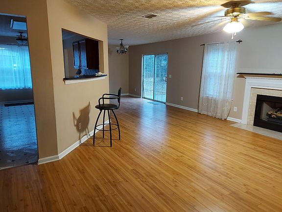 Salon Area / Living Room (with gas logs) & Dinning Room