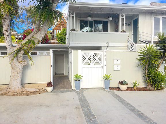 UNIT B entrance. Open gate into patio and front door.