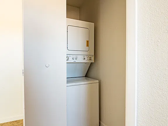 In-home laundry area — representative home at Fairway Vistas Condominiums.