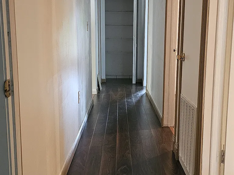 Hallway with 3 guest bedrooms