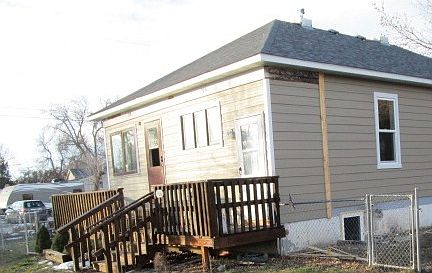 Duplex. Small fenced back yard.