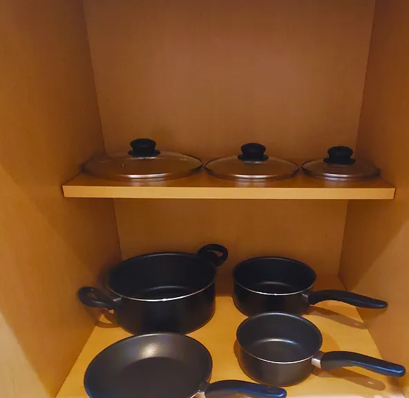 Cook with ease using quality pots, pans, and matching lids.