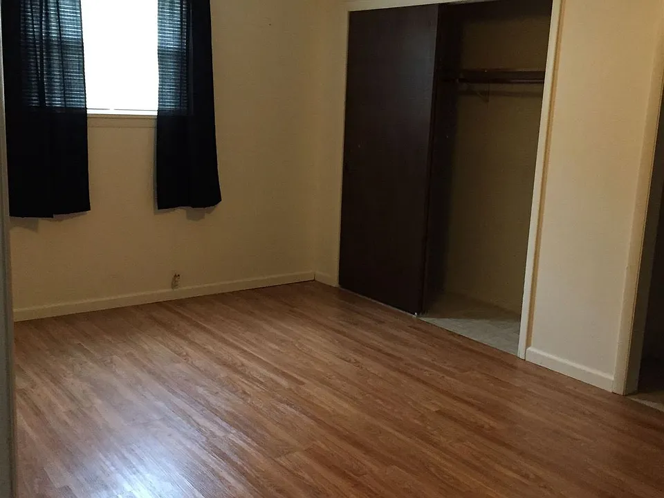 Storage closet off living room is very large.