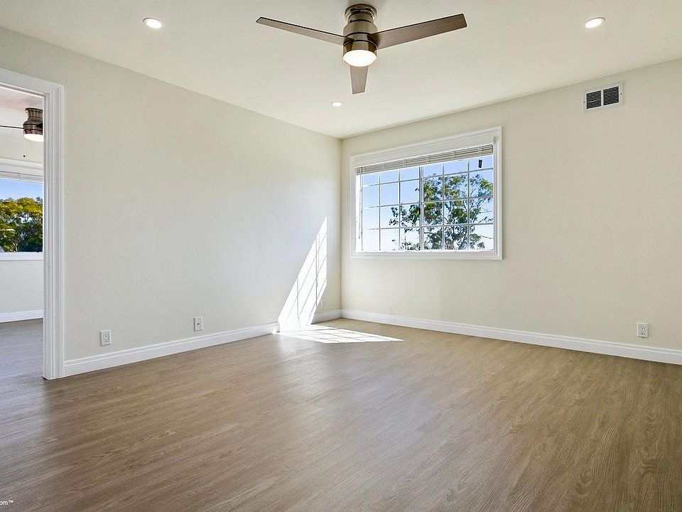 Spacious living room floods with lots of natural light!