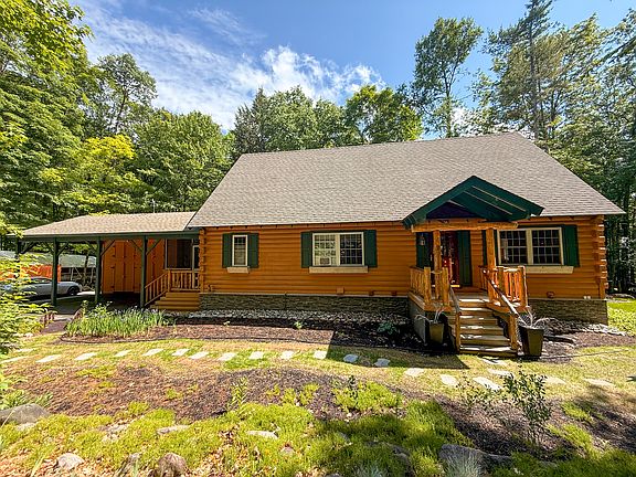 Welcome to 7 B McGowan Circle.
You would be renting the main and upper floor of this beautiful log home. It includes the carport with storage. You would not have access to the basement.