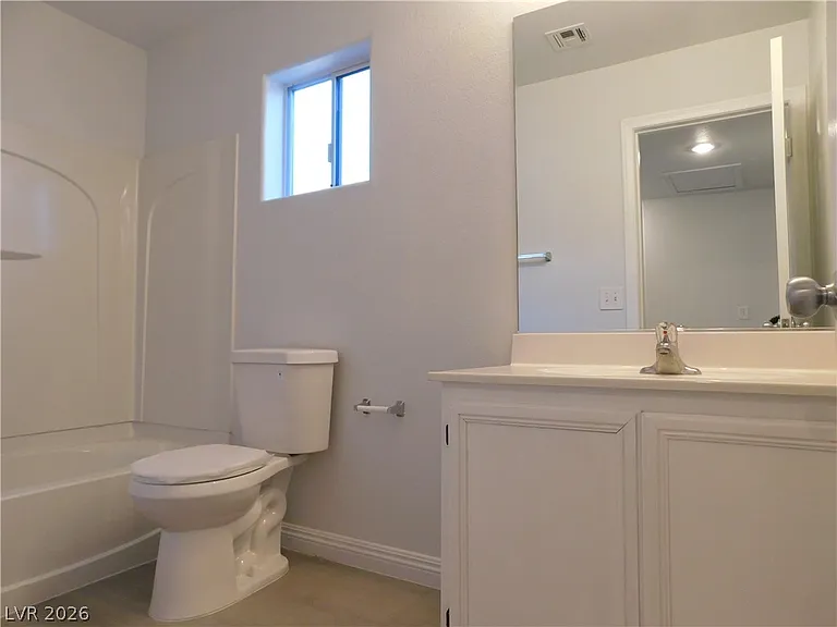 7859 Treasure Ship Ave — Photo 19