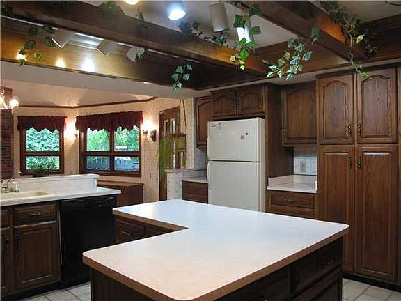 Kitchen: View thru the Kitchen to Door leading to the Rear Wood Deck.