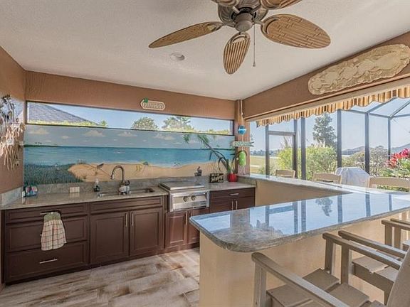 Entertaining is a Breeze with the Outdoor Gas Stove, Sink and Custom Cabinets