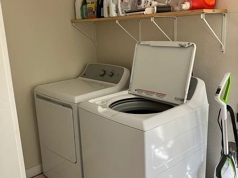 Laundry room with extra storage space (washer/dryer not included)