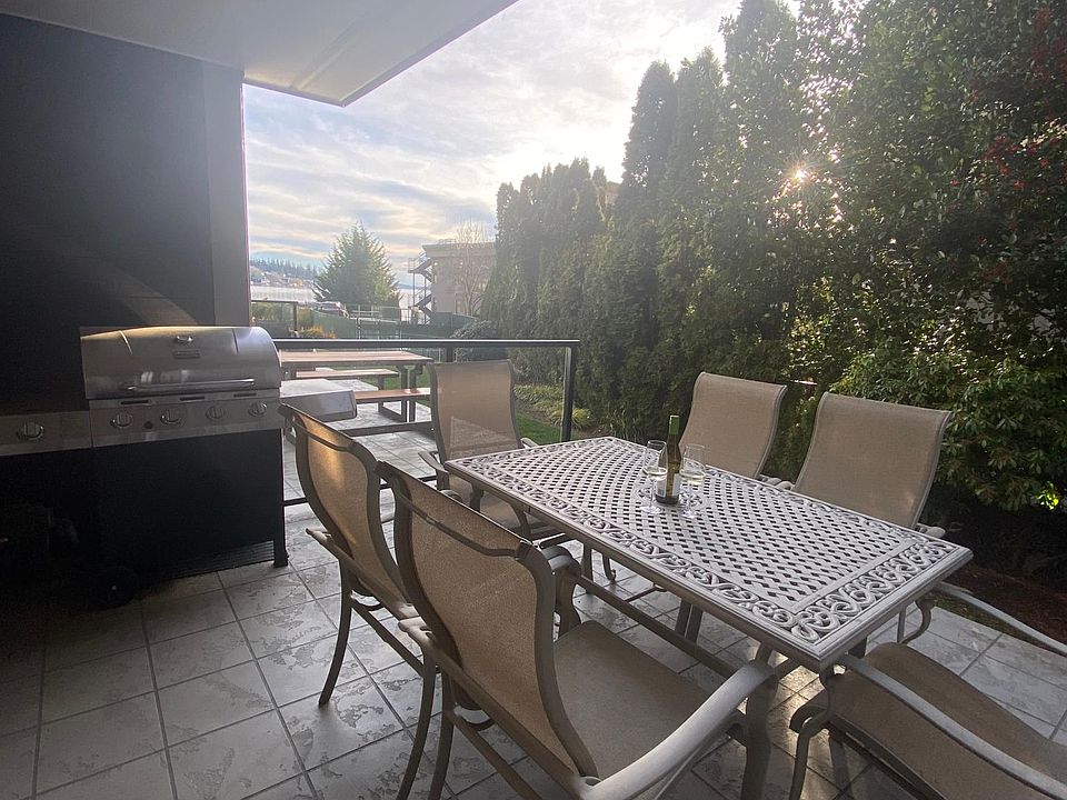 Spacious patio with a stunning lakeside and territorial view! Please note BBQ grill is no longer on the property - Gas hookup is available.