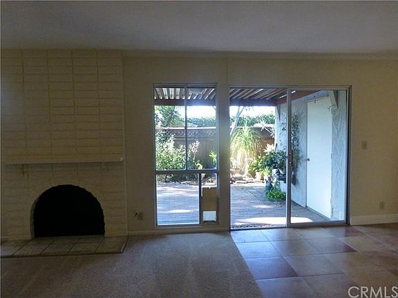 Covered Private back yard with large storage room