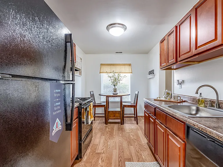 Experience the warmth and functionality of this charming kitchen, perfect for culinary adventures.