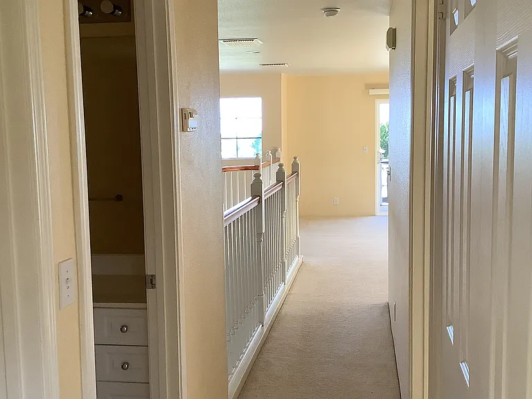 bedroom hallway to loft area