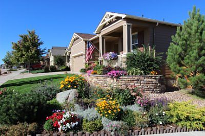 Professionally landscaped front yard.