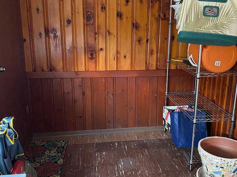 Enclosed porch with washer and dryer