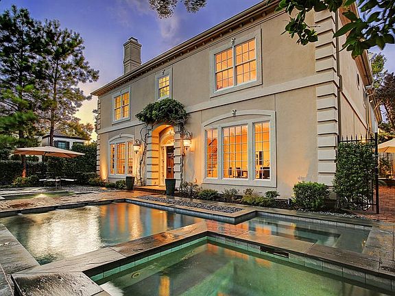 Beautiful European style courtyard with heated saltwater pool and spa. Fully fenced and surrounded by immaculate landscaping providing privacy and enhancing the natural beauty of the property.