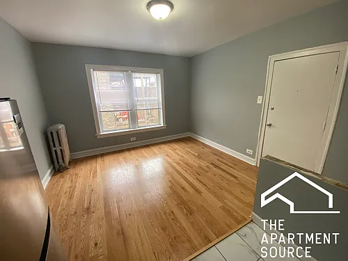 5692 N Ridge Ave #1E Photo 1