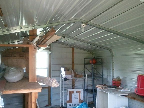 Metal shed on property