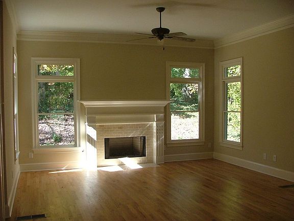 Formal Living Room Fireplace and Screened  In Porch off to the Side!