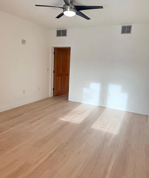 primary bedroom going into closet and bathroom