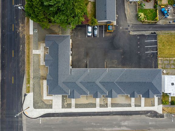 AERIAL VIEW WITH PARKING LOT IN THE BACK