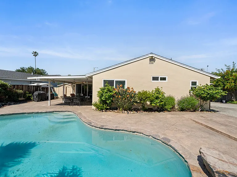 Backyard with resort style landscape