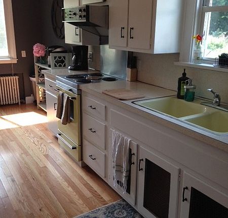 Beautiful Galley Kitchen
						:
						Sun shines on new hardwood floors in this cozy kitchen with large dining area.