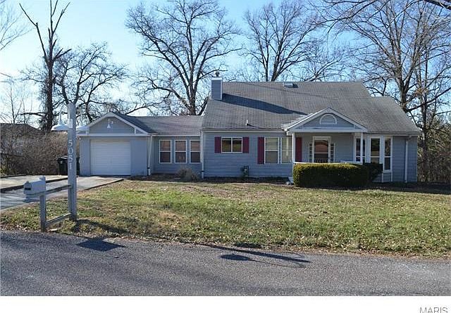 Front view of home - 1 1/2 story, 4 bedroom, 2 bath with partially finished basement!