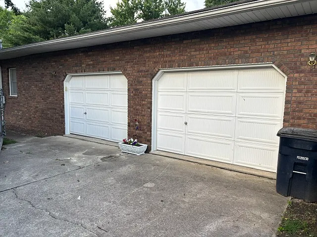 Spacious 2 1/2 car garage/workshop. Insulated and heated!