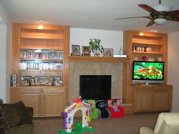 Main level family room w build-ins and gas fireplace