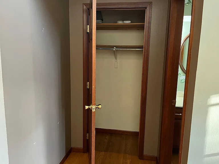 Entry closet next to first floor bathroom.