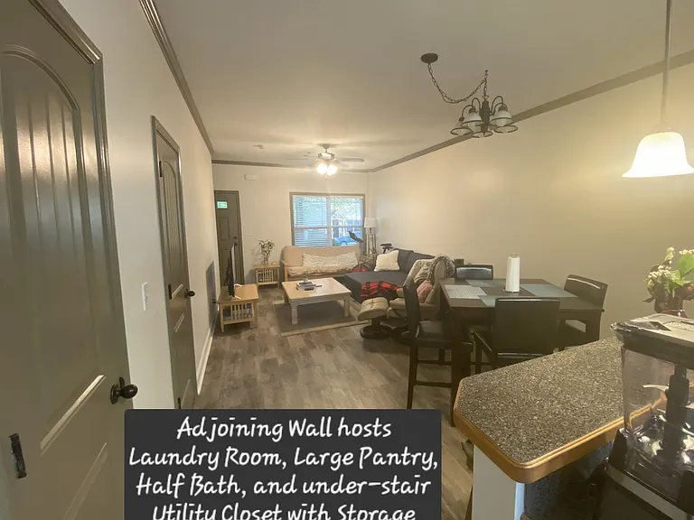 Adjoining Wall hosts Laundry Room, Large Pantry, Half Bath, and Under-stair Utility Closet with Storage
