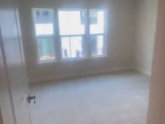 Photo of the master bed with walk-in closet and a dedicated bath