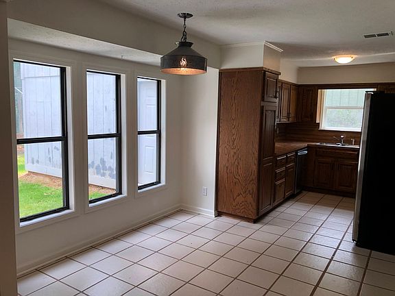 Breakfast nook leading to kitchen