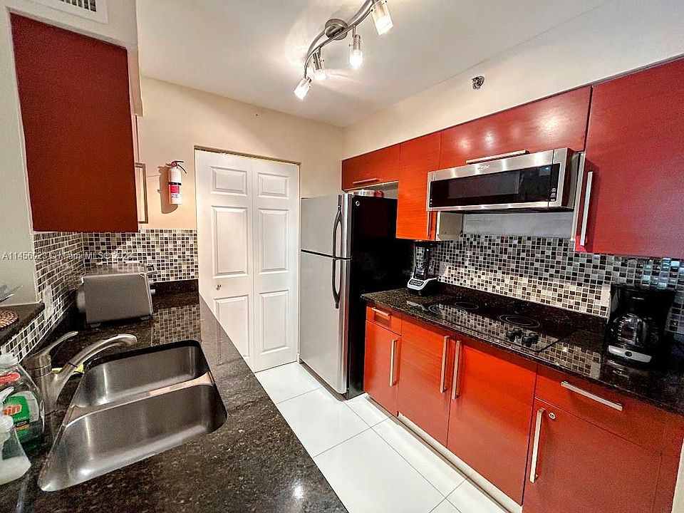 1st image of 19701 E Country Club Dr APT 205
